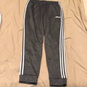 Gray and white Adidas joggers